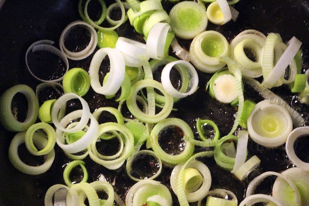 Sauté the leeks until softened and beginning to brown