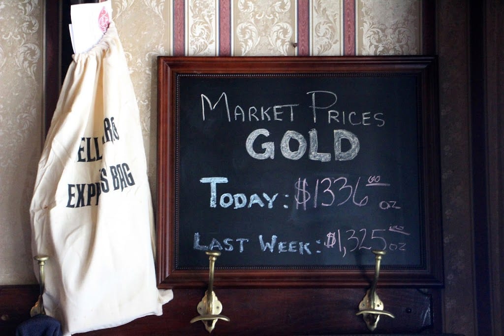 The current price of gold, as noted in the saloon