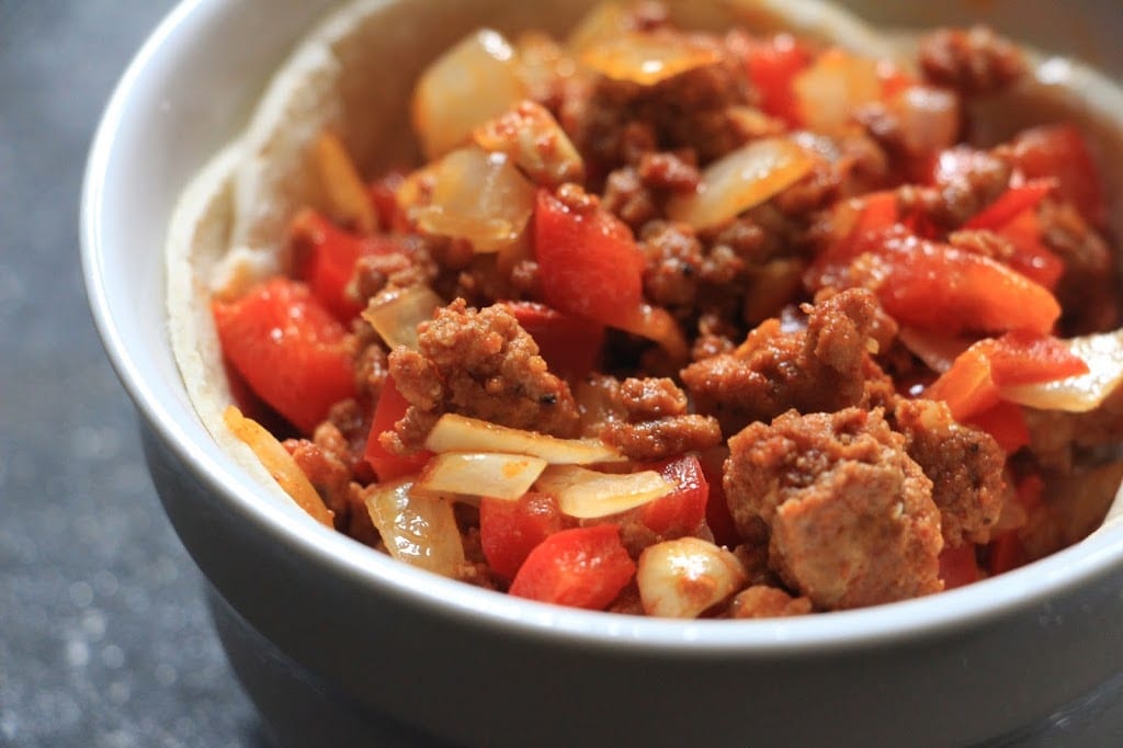 Add the chorizo, pepper, onion mixture to each tortilla bowl