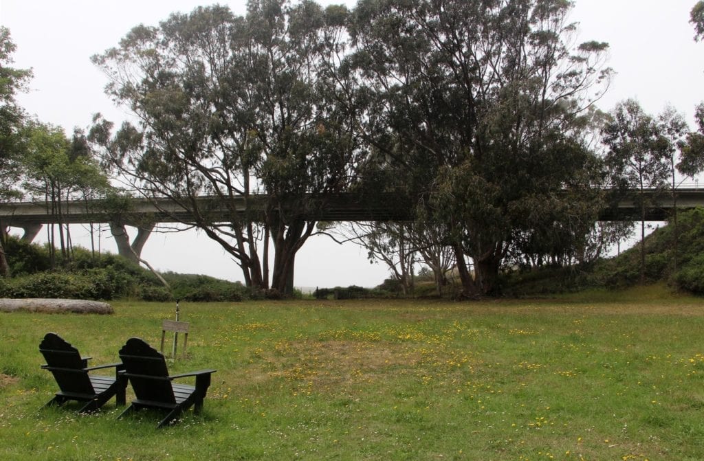 The beach lies just beyond the bridge for Highway One