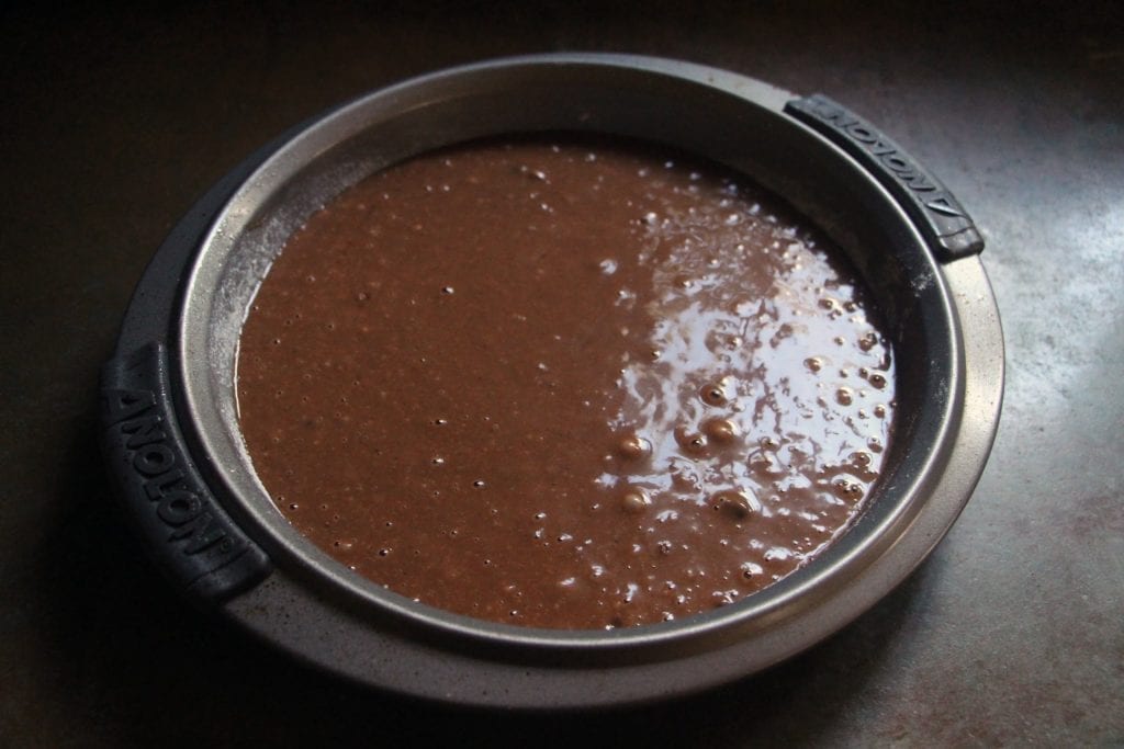 Pour batter into a greased and floured 9-inch baking pan and bake for 30 minutes at 350°F