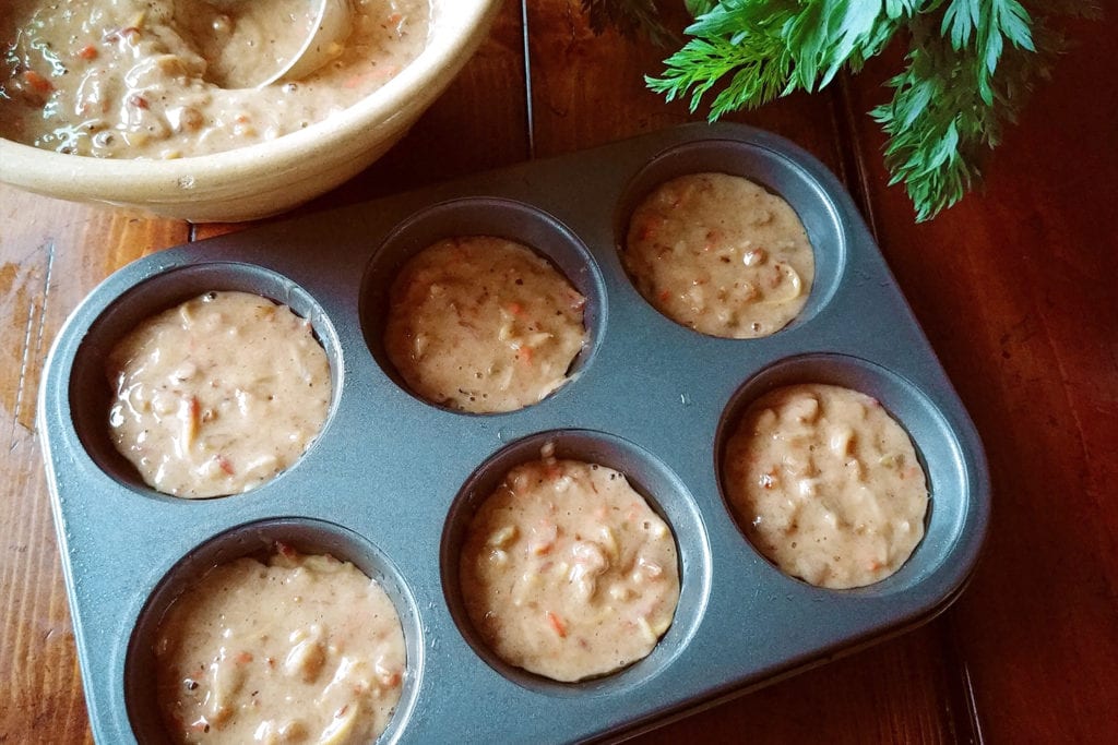 Batter for Strawberry Creek Inn's carrot cake muffins in muffin tin