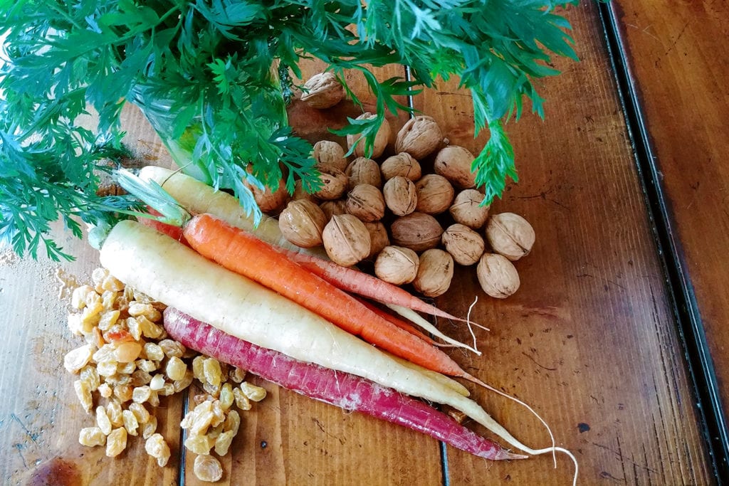 Fresh carrots, toasted walnuts, and rum-soaked raisins give this recipe from the Strawberry Creek Inn its distinctive flavor.