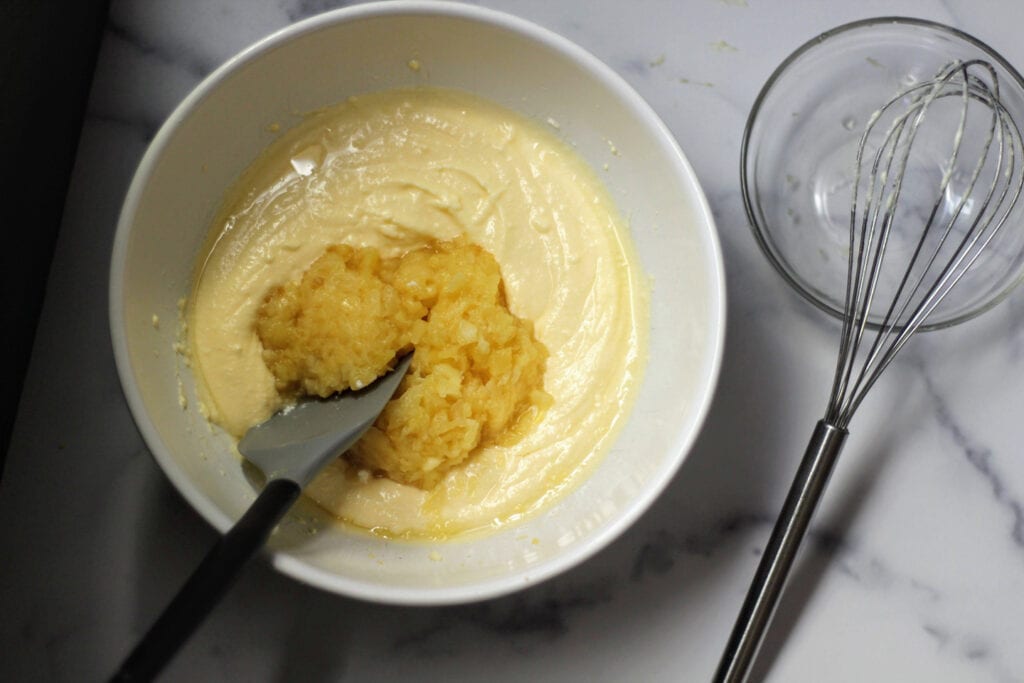 Fold crushed pineapple into ricotta mixture.