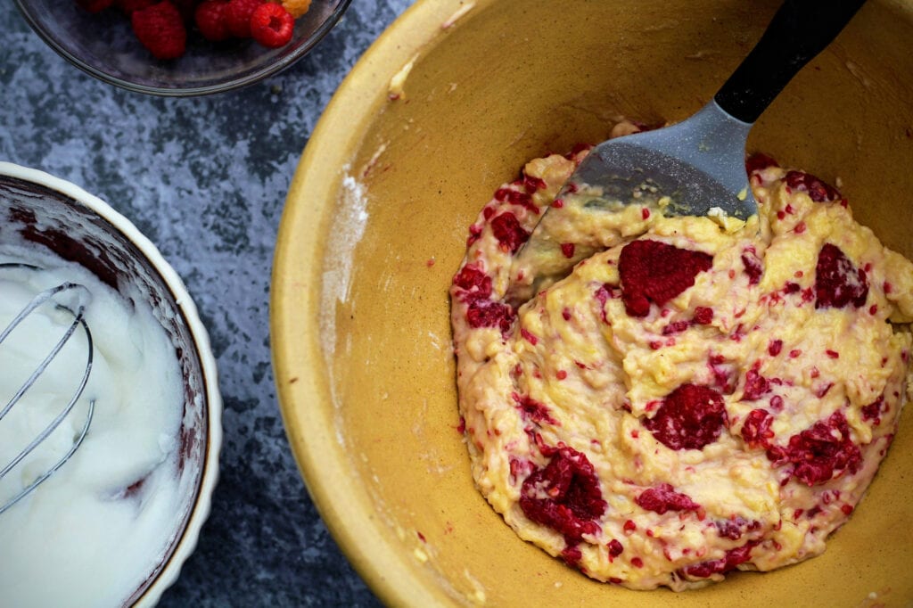 Gently fold berries, then egg whites, into the yogurt mixture.