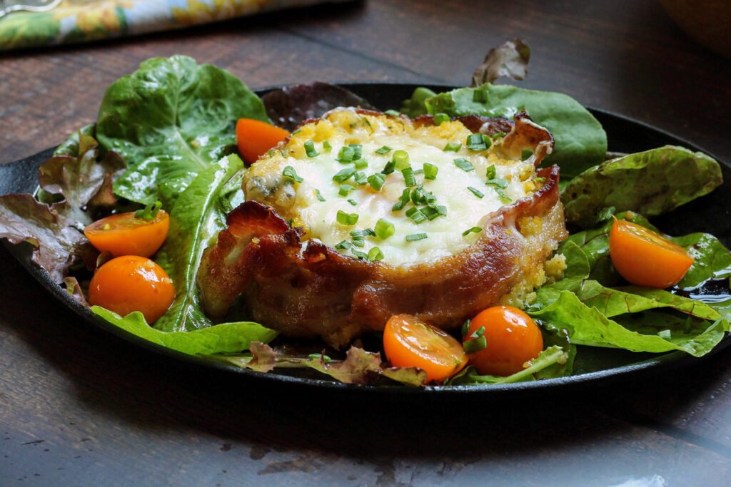 Inn on Randolph’s Bacon-Wrapped Polenta with Baked Eggs