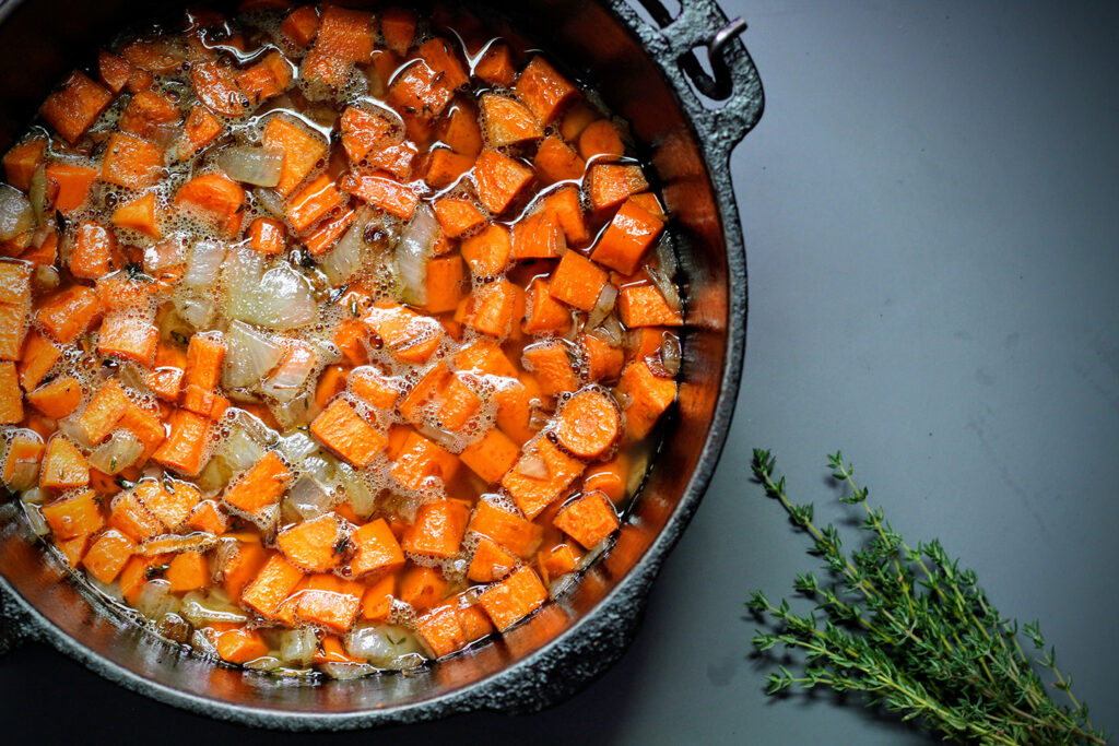 Add carrots, broth, and water. Simmer until carrots are tender.