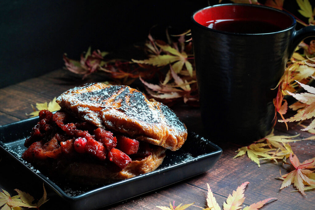 Candlelight Inn’s Croissant French Toast with Spiced Apples, Pears, and Cranberries.