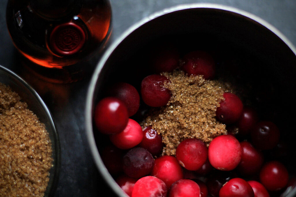 Cook cranberries, Grand Marnier, and brown sugar until cranberries are tender.