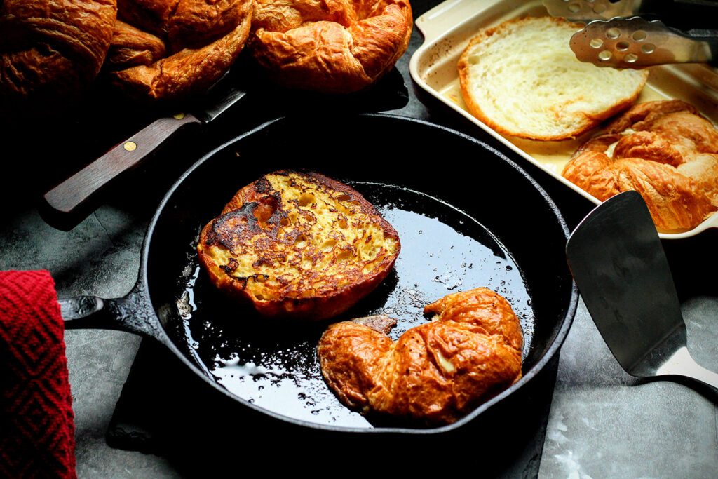 Dip croissants into egg mixture and cook until golden brown on both sides.