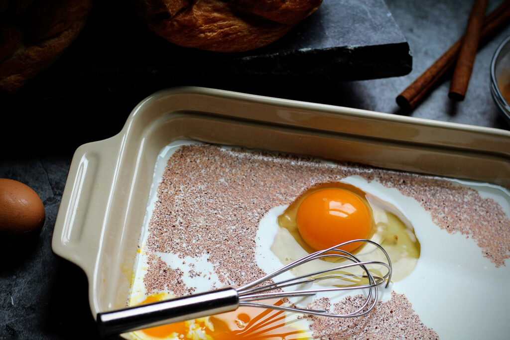 Whisk together half and half, eggs, cinnamon, and powdered sugar.