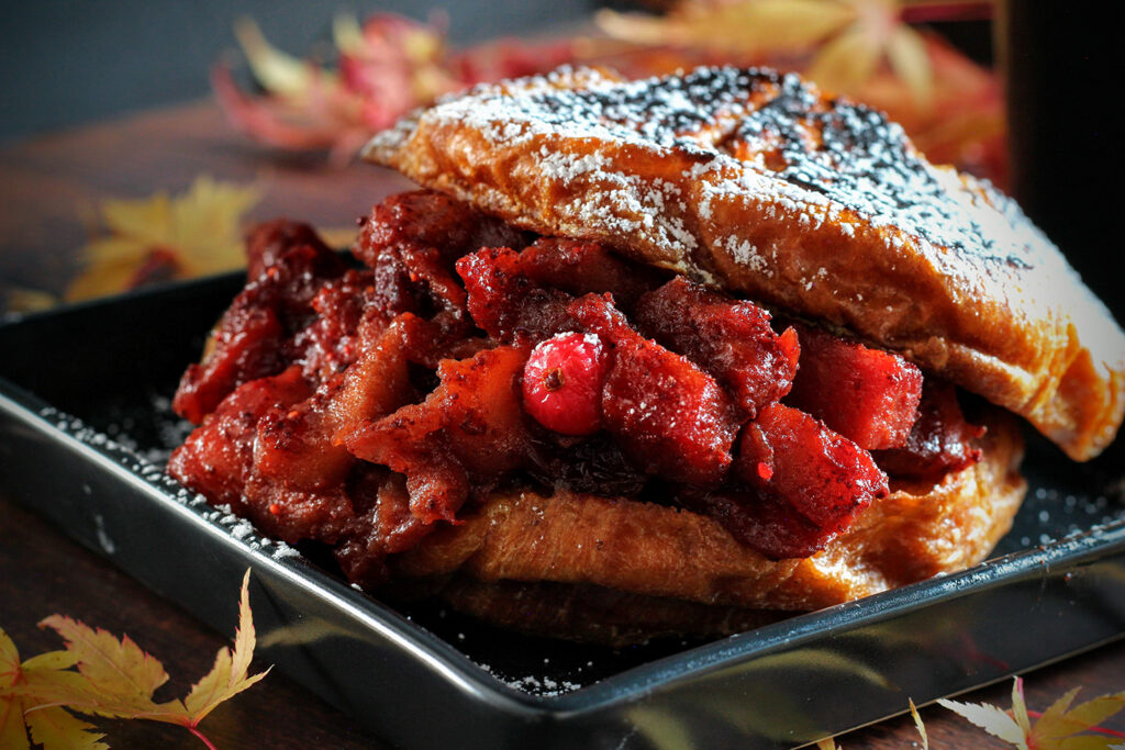 Candlelight Inn’s Croissant French Toast with Spiced Apples, Pears, and Cranberries.