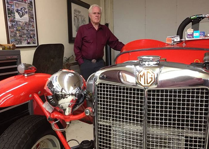 Don Martine and one of the vintage MGs in his collection at the Martine Inn