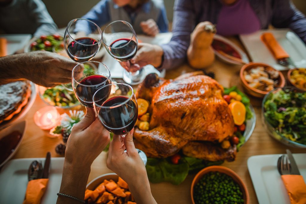 Toasting with wine during Thanksgiving dinner