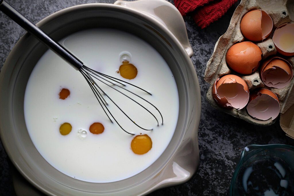 Mix milk, eggs, and vanilla to pour over the bread pudding