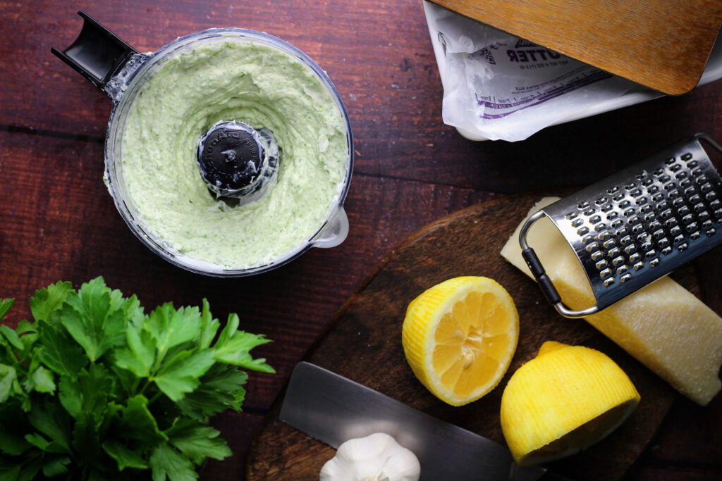 Mix butter, lemon juice, parsley, garlic, and cheese in a food processor until smooth.
