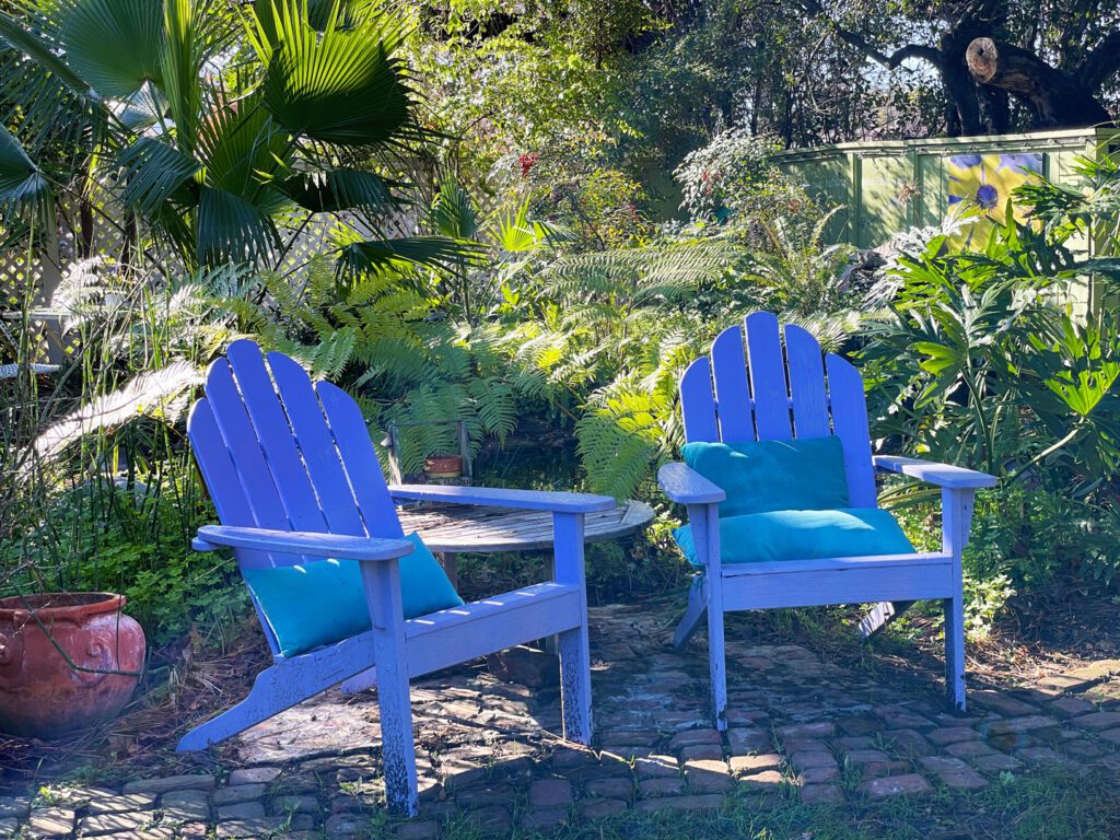 Adirondack chairs in the garden at the Lavender Inn