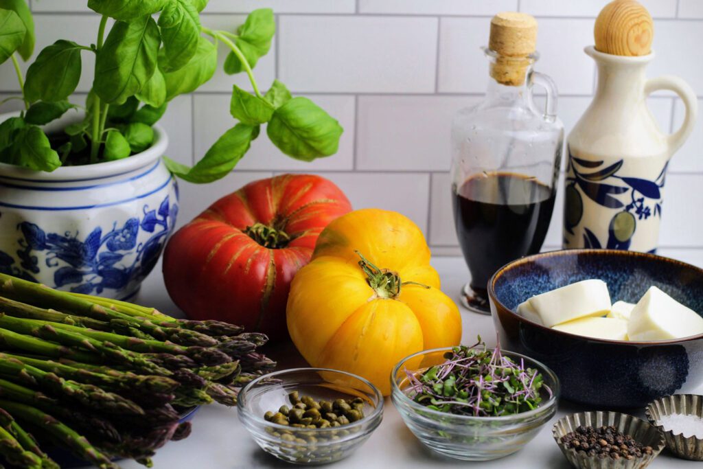 Asparagus, basil, tomatoes, capers, microgreens, mozzarella and oil and balsamic vinegar