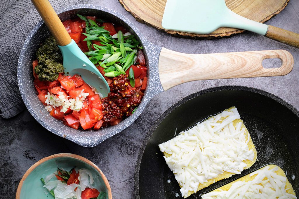 salsa ingredients and polenta wedges sprinkled with cheese