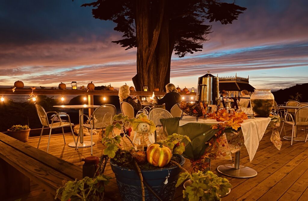 Outdoor dining deck at Elk Cove Inn & Spa