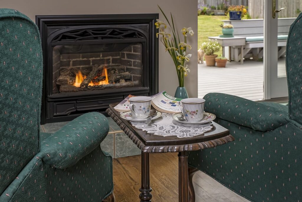 Fireplace seating in the common area at the Westport Hotel