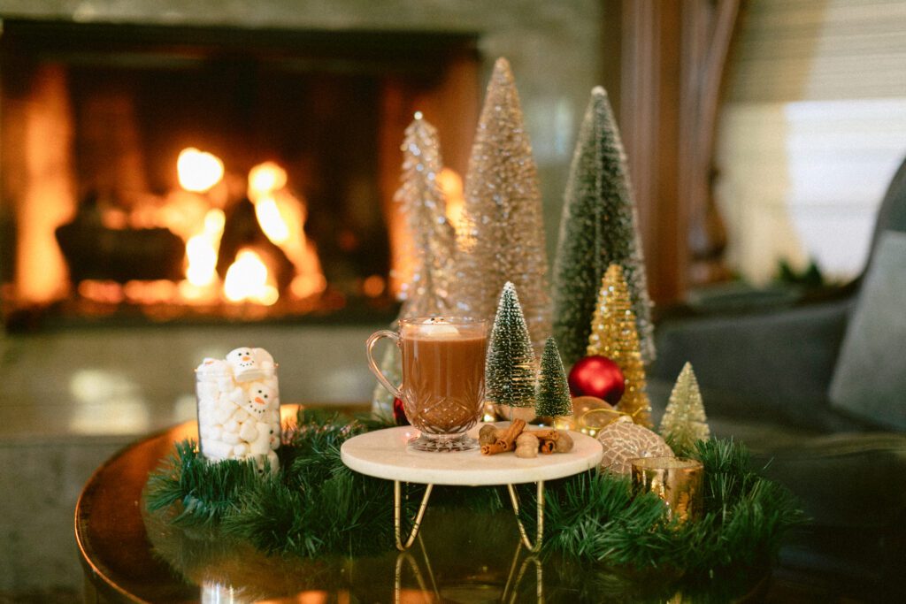 Hot cocoa by the fire at The Genevieve