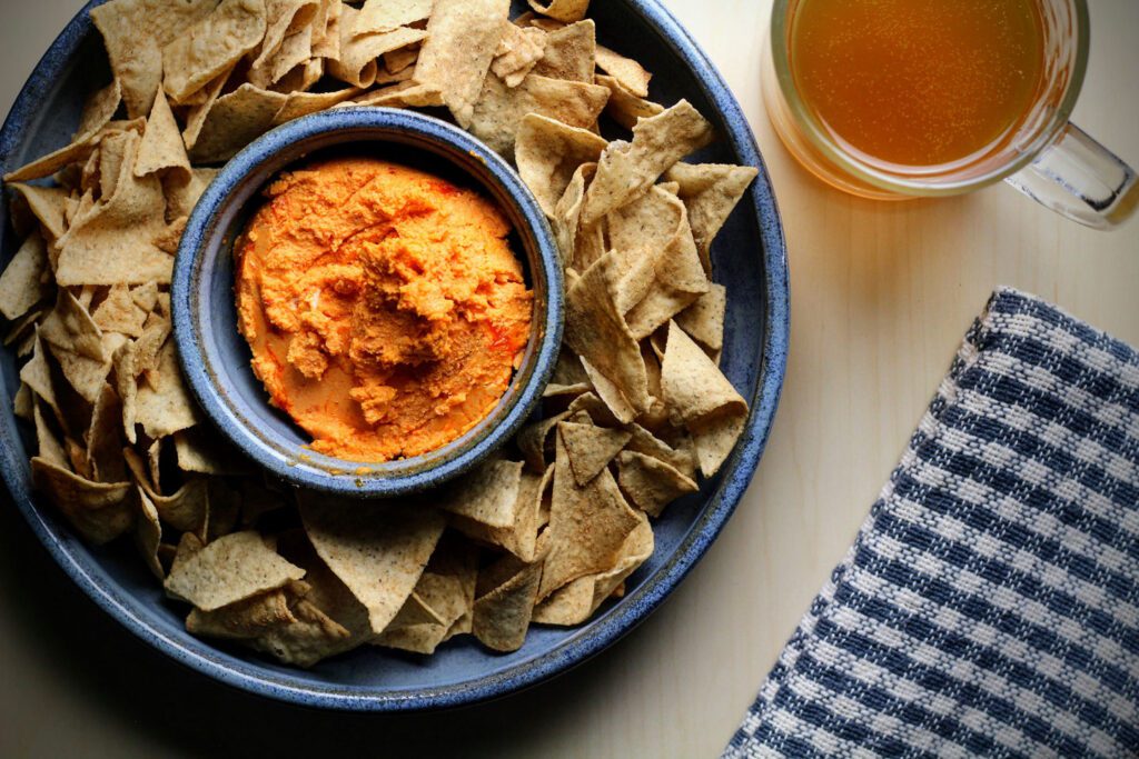 Fiscalini Cheddar Pimento Cheese served as a dip for tortilla chips