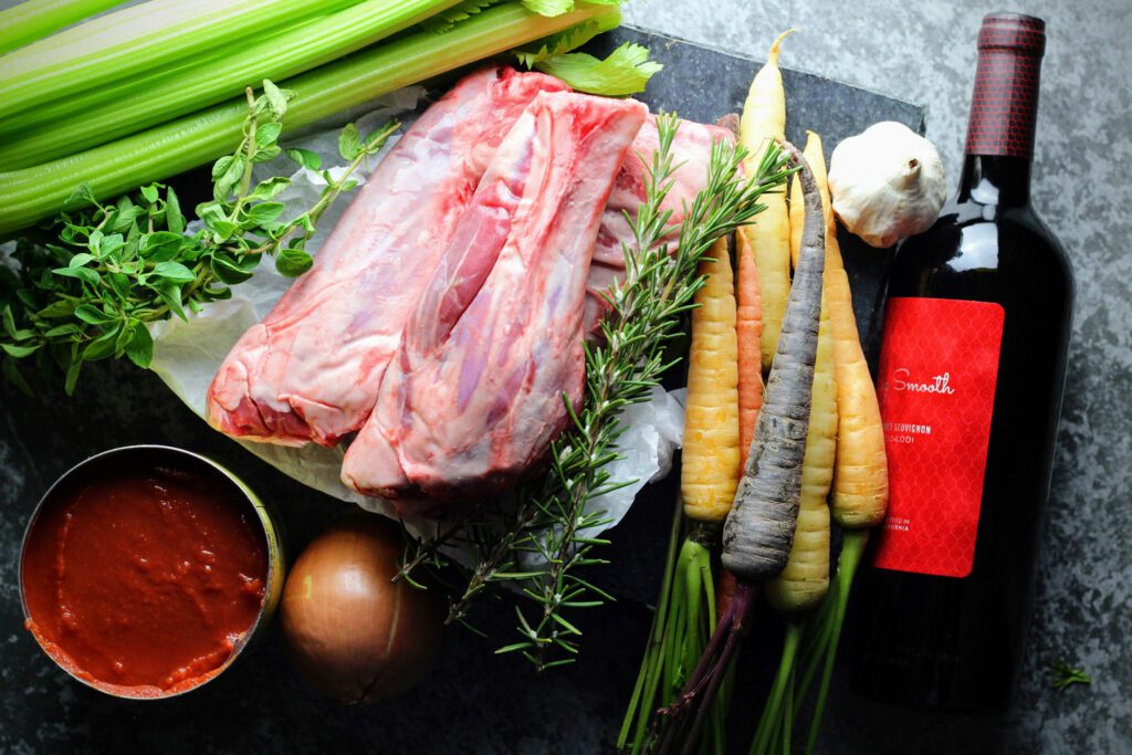 Celery, lamb shanks, herbs, carrots, red wine and tomato puree