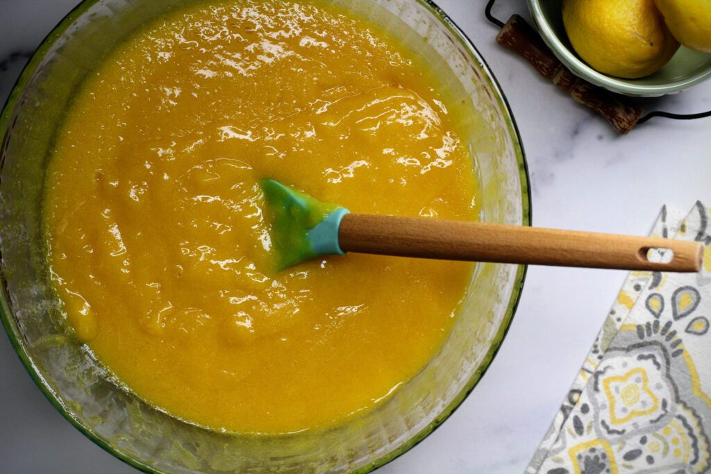 After combining all ingredients, stir continuously over double boiler until the lemon curd thickens. 