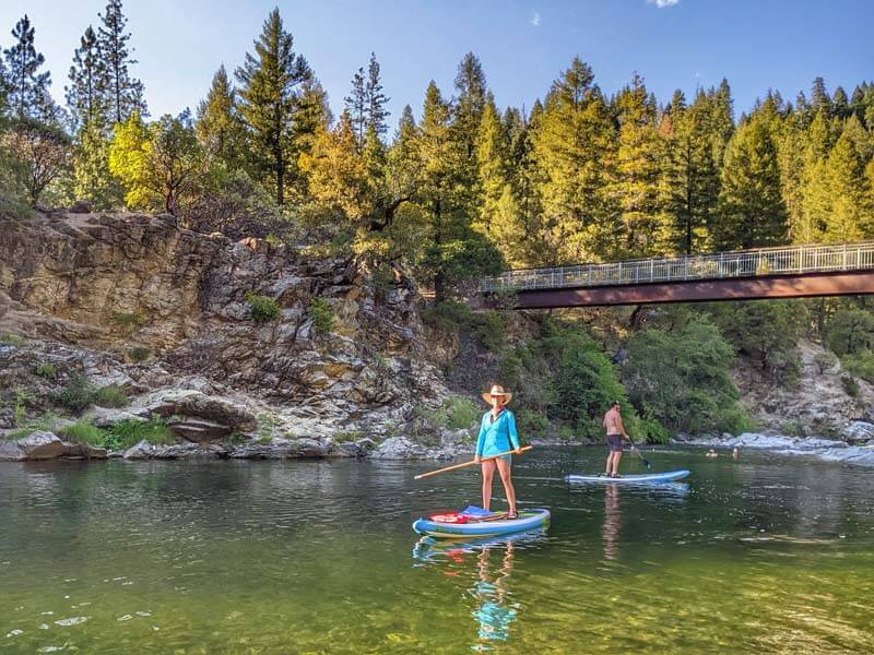 Stand up paddle boarding on the river in Downieville, photo courtesy of Discover Downieville