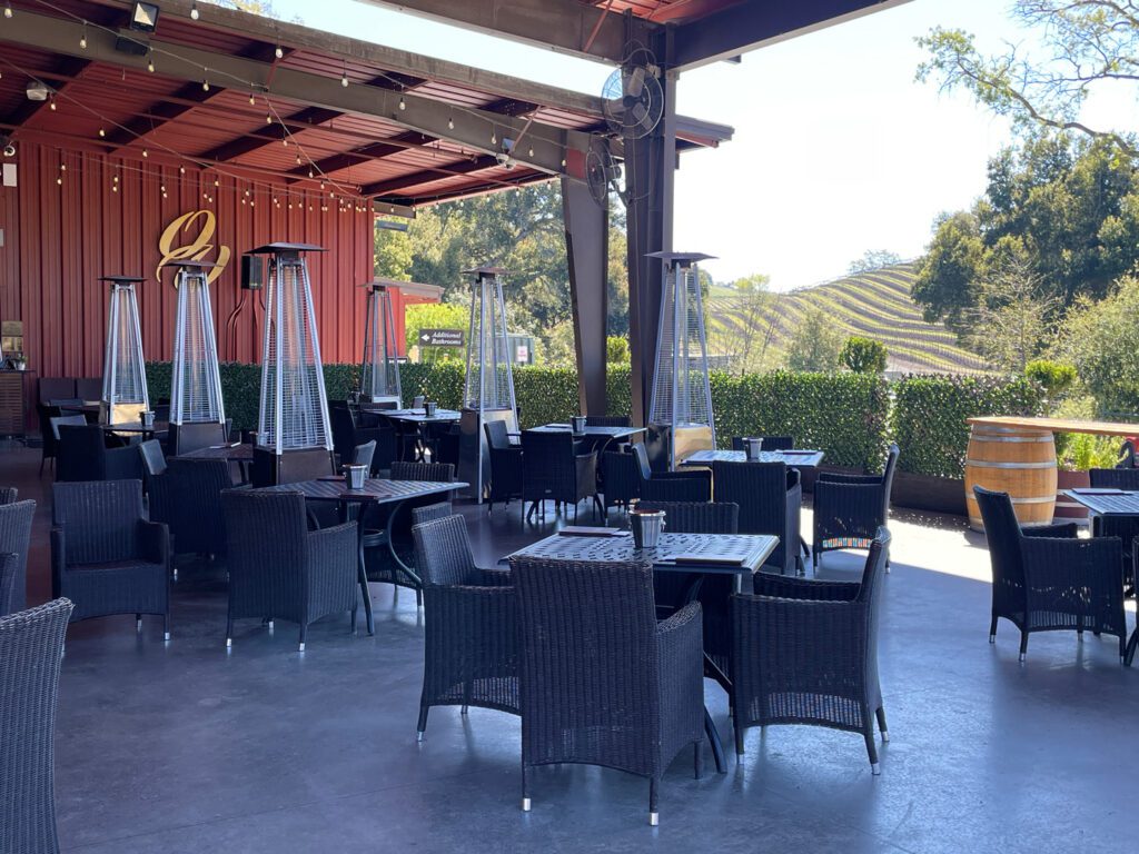 Outdoor seating under the pavilion at the tasting room for Opolo Vineyards