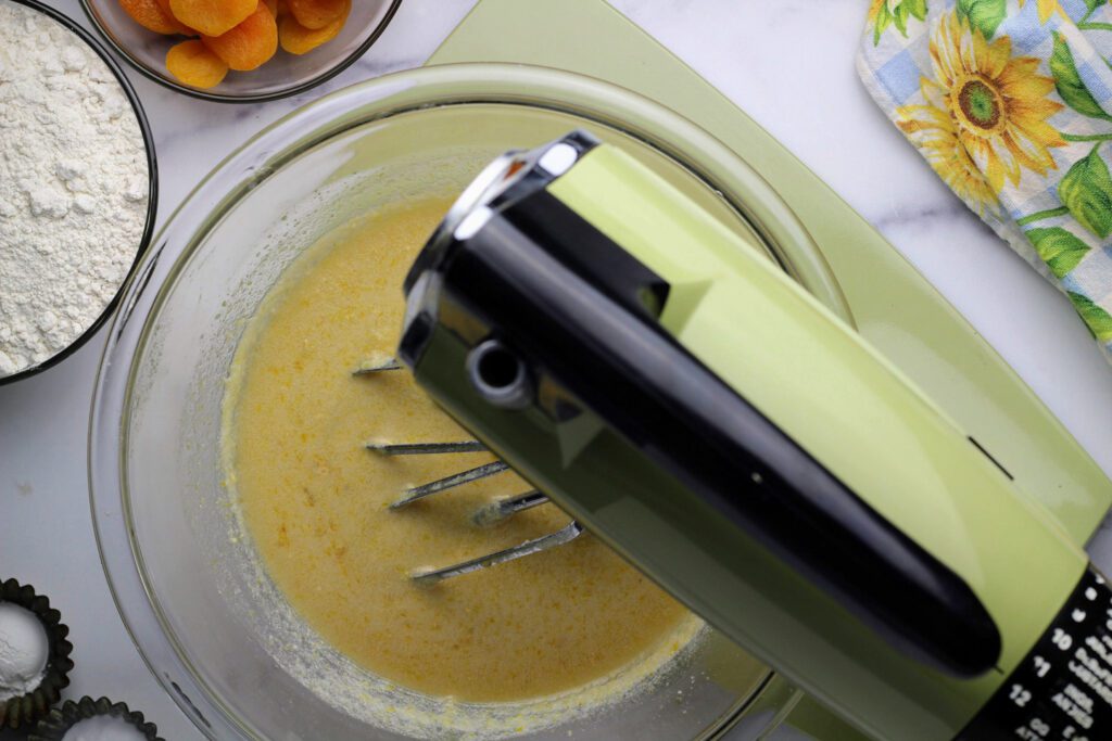 mixing the batter with a mixer