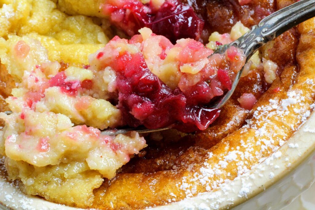 Apple Cranberry Puffed Pancakes close-up with fork