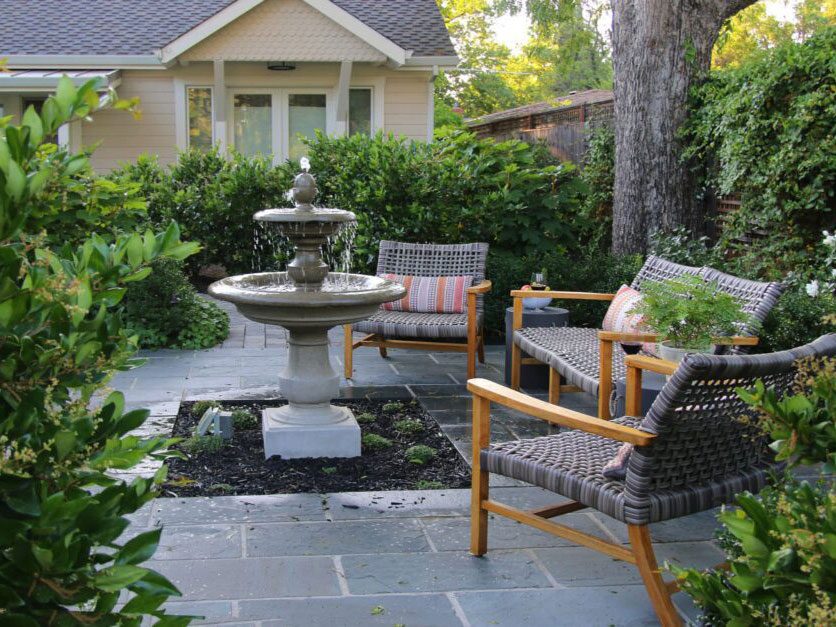 Courtyard fountain and outdoor seating at The Atlas