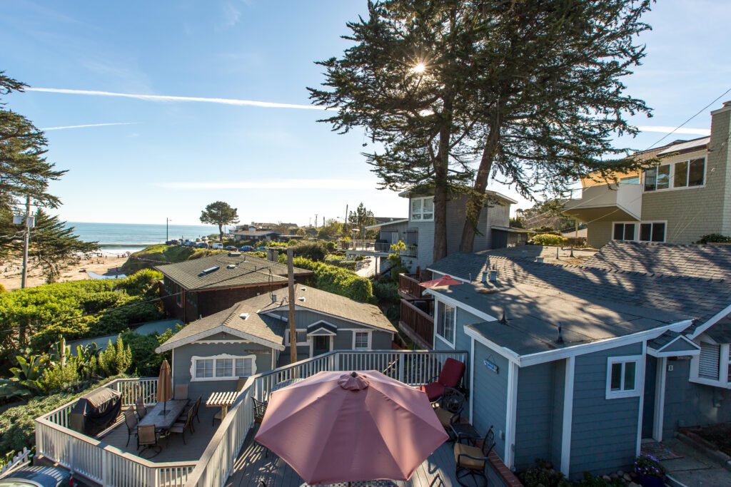 View of Sunny Cove Beach from the Captain's Quarters at Ocean Echo Inn & Beach Cottages