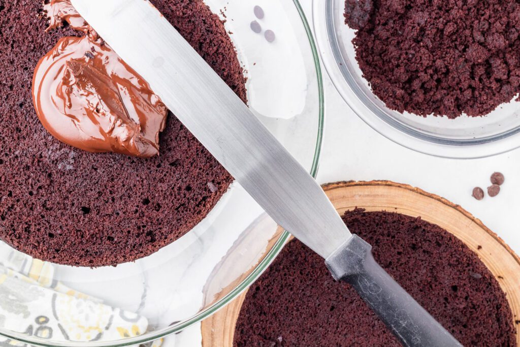 Cutting the cake layers in half