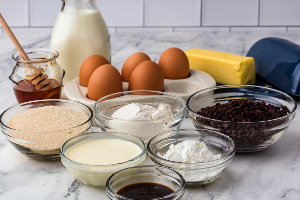 Honey, milk, eggs, butter, sugar, flour, chocolate chips, heavy cream, cornstrach, and vanilla