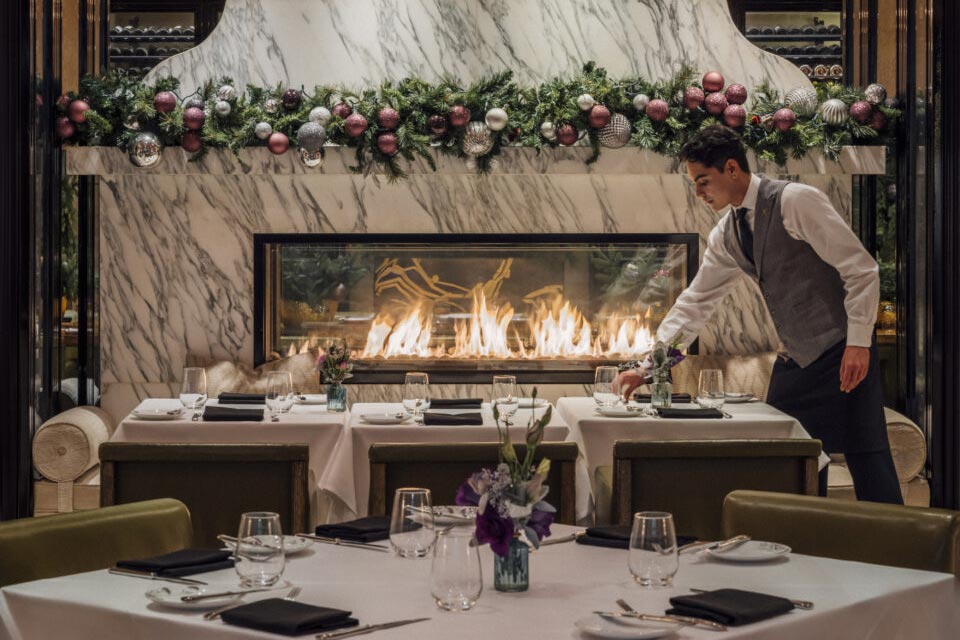 Marble fireplace in the dining room of the Hotel Bel-Air